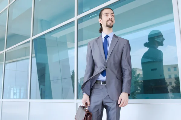 Young businessman on the street — Stock Photo, Image