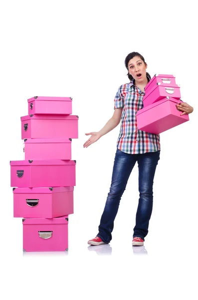 Fille avec pile de boîtes-cadeaux sur blanc — Photo