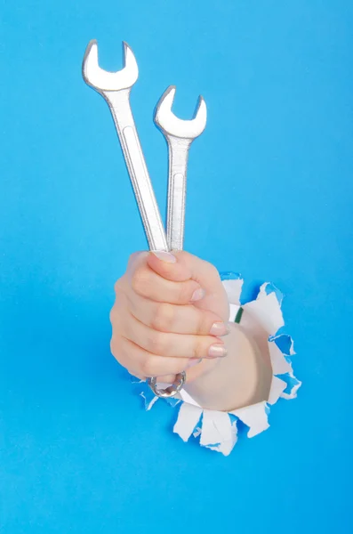 Hand holding chrome wrenh — Stock Photo, Image