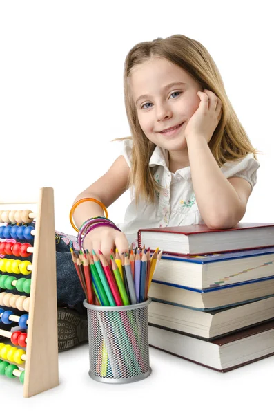 Meisje met boeken en abacus — Stockfoto