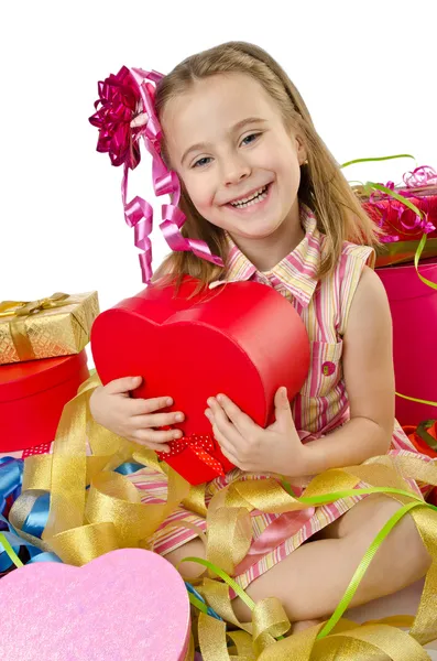 Conceito de celebração com menina e caixas de presente — Fotografia de Stock