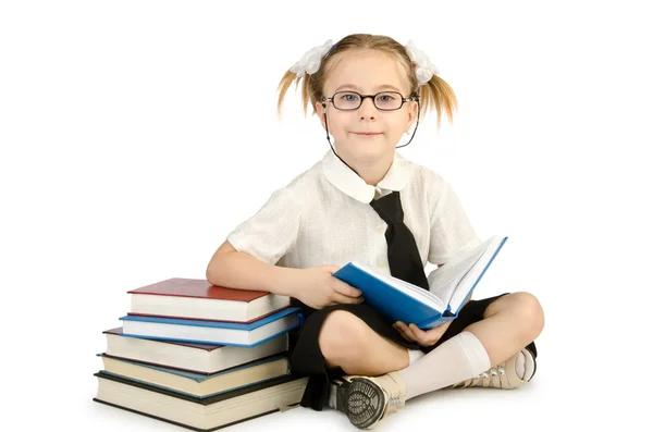Beyaz kitapları ile küçük kız — Stok fotoğraf