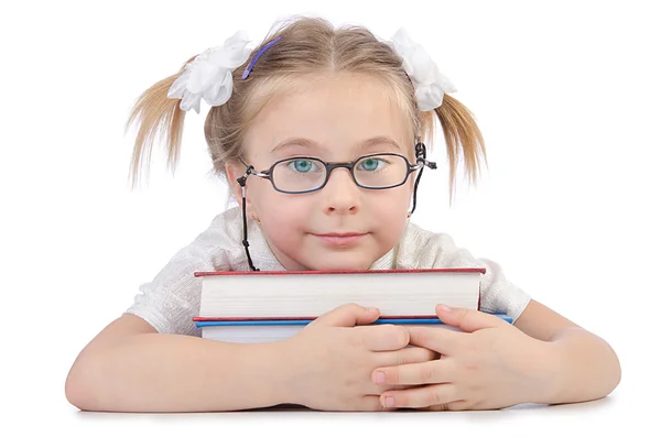 Kleines Mädchen mit Büchern auf weiß — Stockfoto