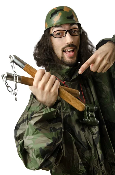 Funny soldier with nunchaku — Stock Photo, Image