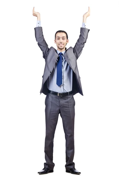 Young businessman pushing invisible obstacles — Stock Photo, Image