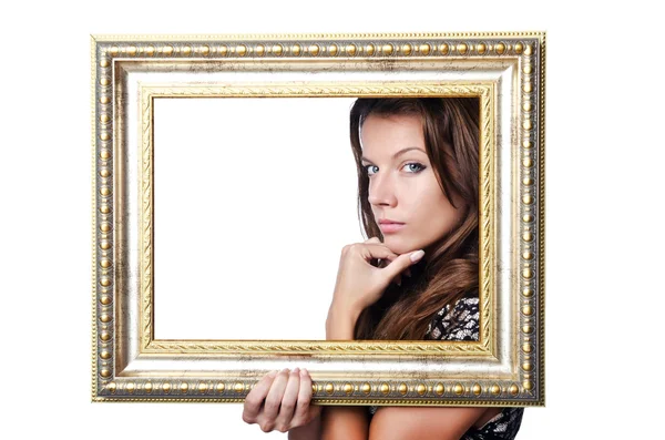 Young woman with picture frame on white — Stock Photo, Image