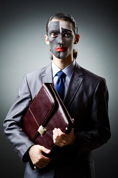 Businessman with clown face paint — Stock Photo, Image