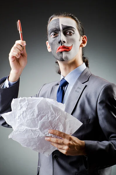 Businessman with clown face paint — Stock Photo, Image