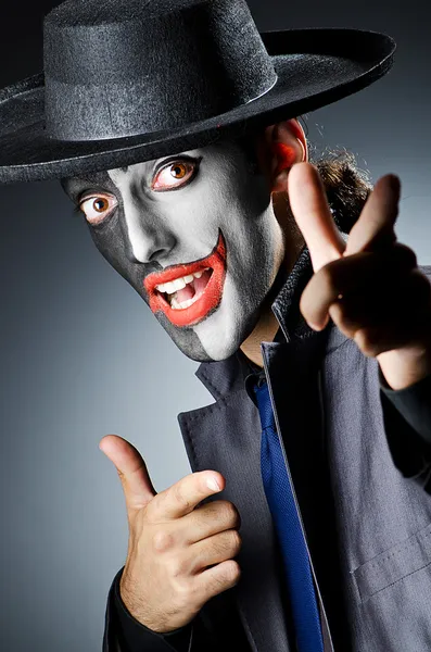 Businessman with clown face paint — Stock Photo, Image