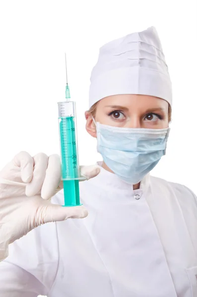Woman doctor with syringe on white Royalty Free Stock Photos