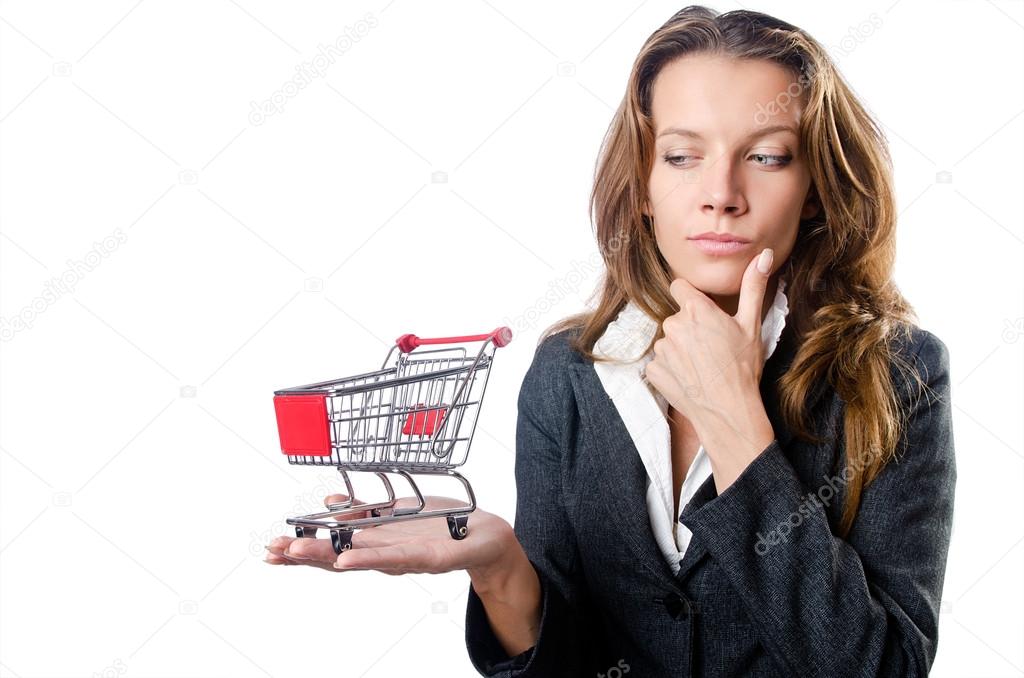 Attractive businesswoman with shopping cart