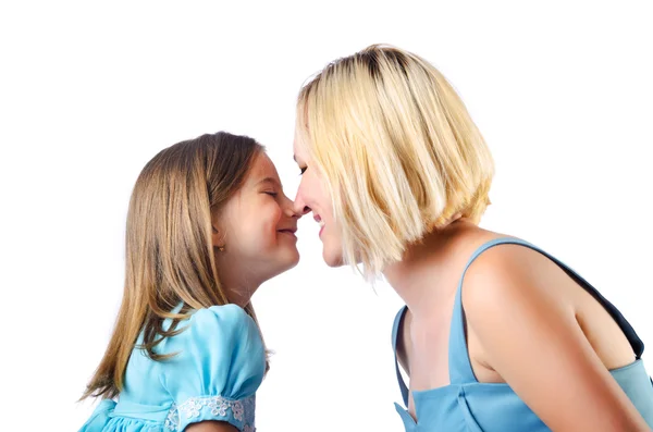 Mãe feliz e filha no branco — Fotografia de Stock