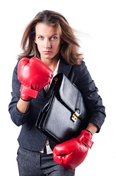 Angry businesswoman with boxing gloves — Stock Photo, Image