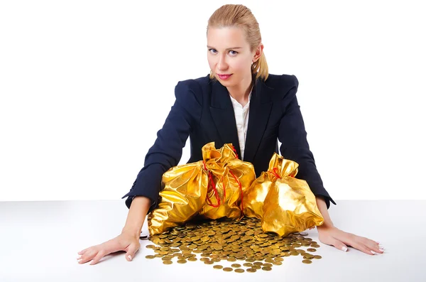 Woman with coins and golden sacks — Stock Photo, Image