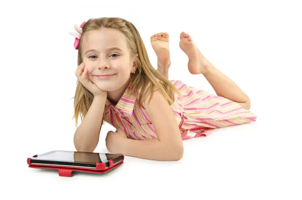 Little girl with tablet on white — Stock Photo, Image