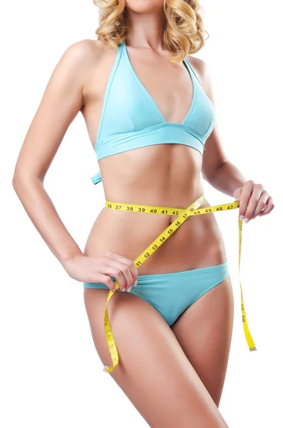 Young lady with centimetr in weight loss concept — Stock Photo, Image