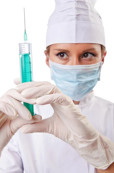 Woman doctor with syringe on white — Stock Photo, Image