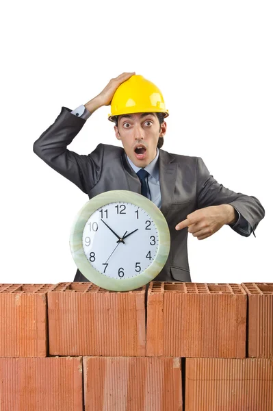 Businessman with bricks on white — Stock Photo, Image