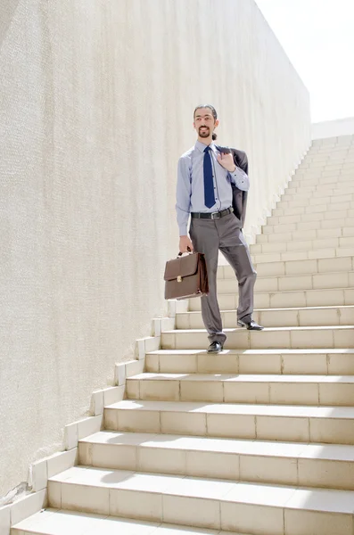 Businessman with stair in business concept — Stock Photo, Image