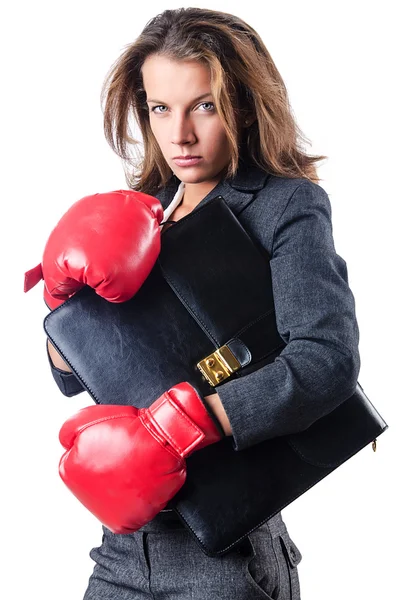 Angry businesswoman with boxing gloves — Stock Photo, Image