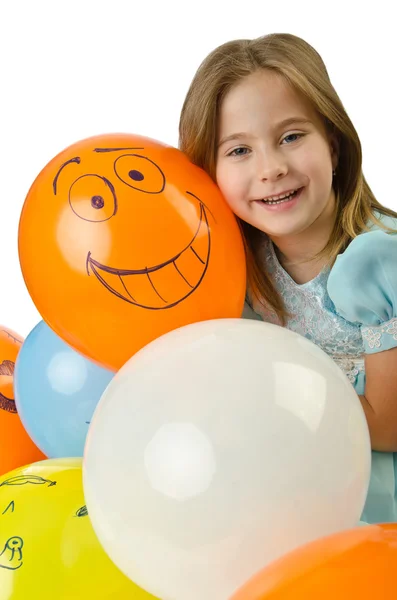 Bambina con palloncini su bianco — Foto Stock