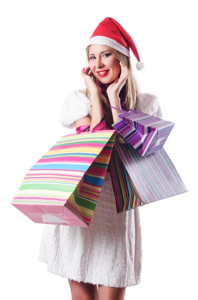 Noel alışverişinde genç bir kadın — Stok fotoğraf