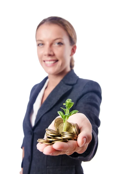 Businesswoman with seedlings and coins — Stock Photo, Image