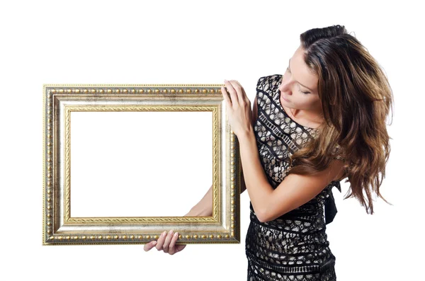 Young woman with picture frame on white — Stock Photo, Image