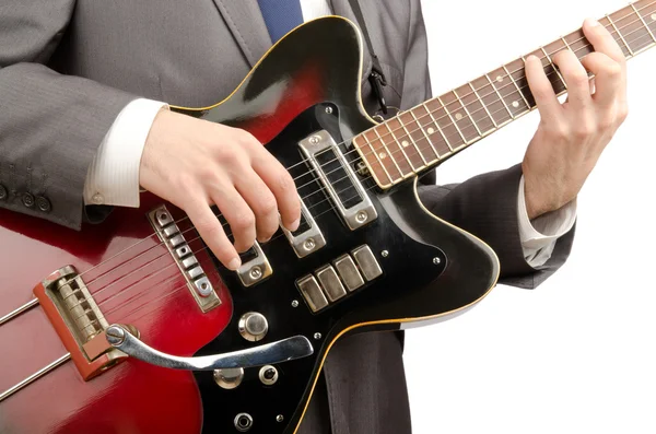 Gitarrist im Business-Anzug auf Weiß — Stockfoto