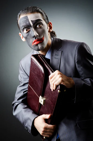 Businessman with clown face paint — Stock Photo, Image