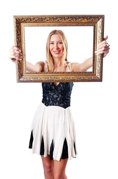 Young woman with picture frame on white — Stock Photo, Image