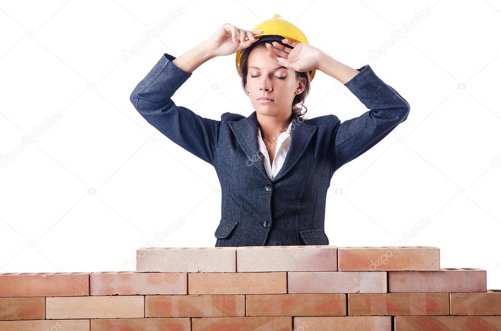 Woman builder on white