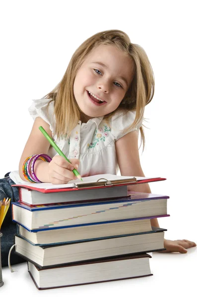 Mädchen mit Büchern und Abakus — Stockfoto