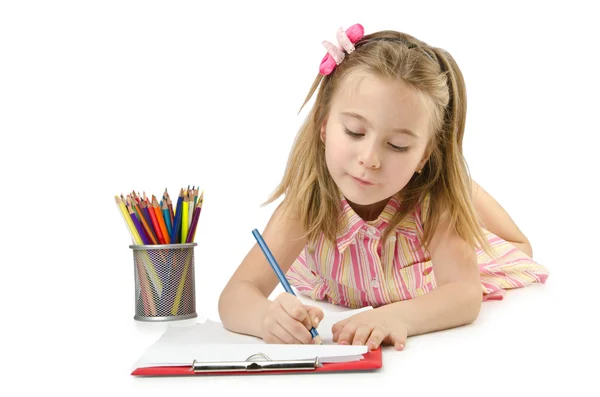 Niña escribiendo con lápices — Foto de Stock