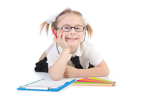 Petite fille écrivant avec des crayons — Photo