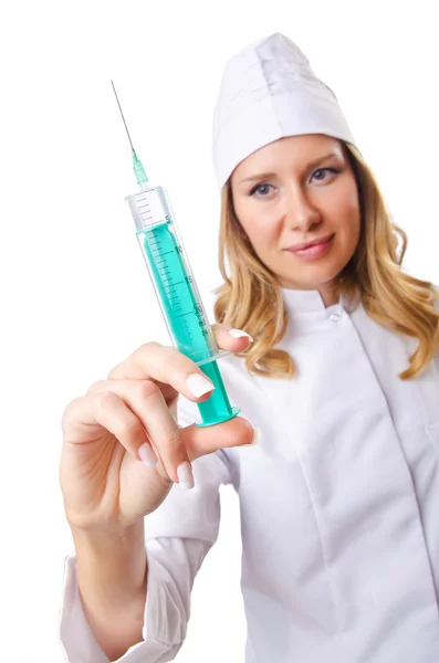 Woman doctor with syringe on white — Stock Photo, Image