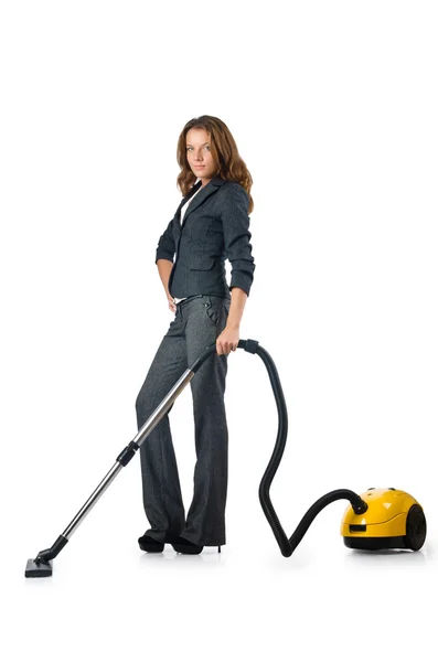 Businesswoman cleaning with vacuum cleaner — Stock Photo, Image
