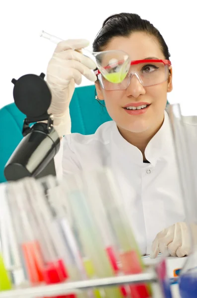 Female chemist in studio on white — Stock Photo, Image