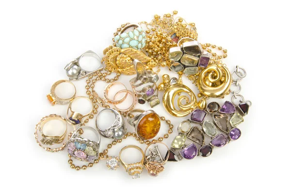 Lots of jewellery on white — Stock Photo, Image