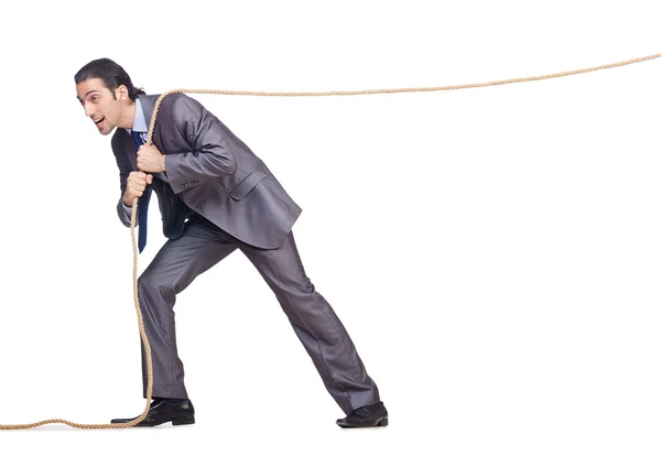 Geschäftsmann zieht Seil auf Weiß — Stockfoto