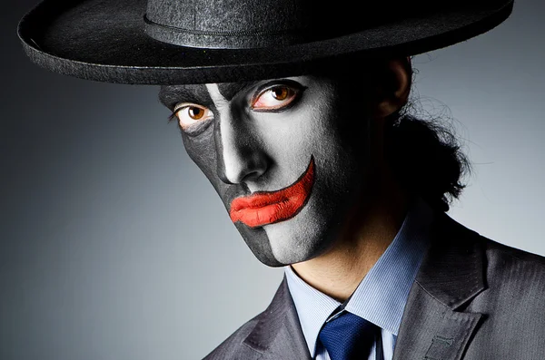 Businessman with clown face paint — Stock Photo, Image