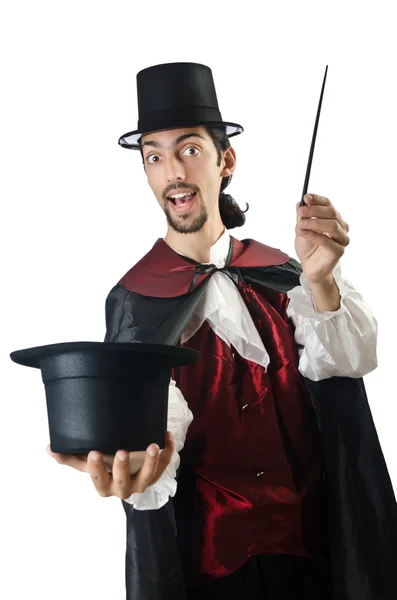 Magician doing tricks on white — Stock Photo, Image