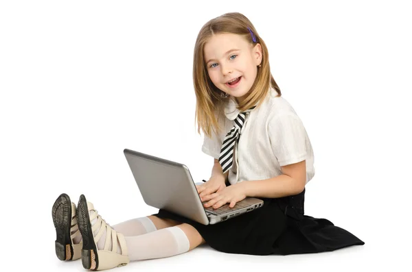 Leuk meisje met laptop op witte — Stockfoto