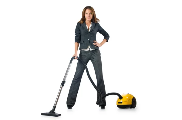 Businesswoman cleaning with vacuum cleaner — Stock Photo, Image