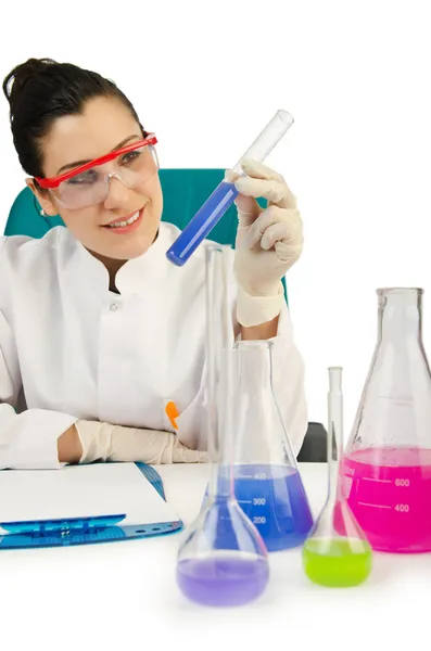 Female chemist in studio on white — Stock Photo, Image