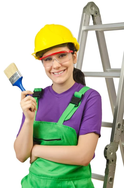 Woman worker with ladder on white — Stock Photo, Image