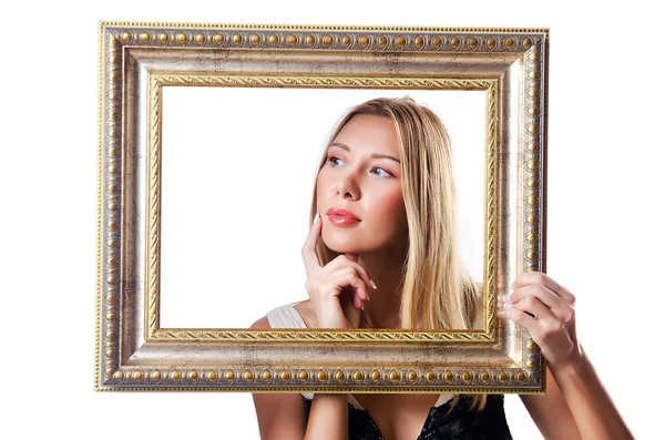 Woman with picture frames on white — Stock Photo, Image