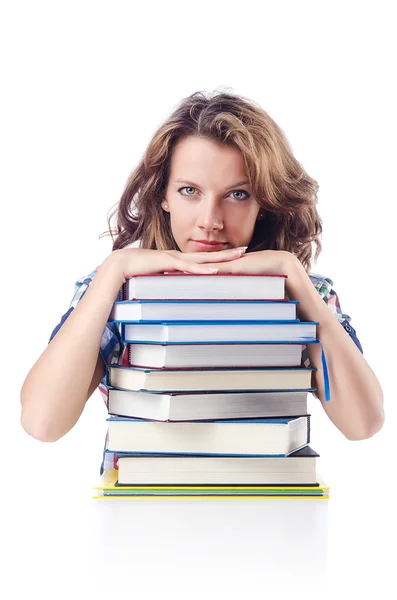 Studente con molti libri sul bianco — Foto Stock