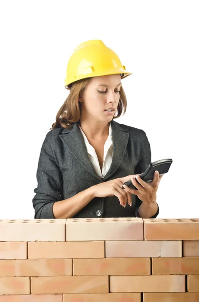 Expensive construction concept with woman — Stock Photo, Image