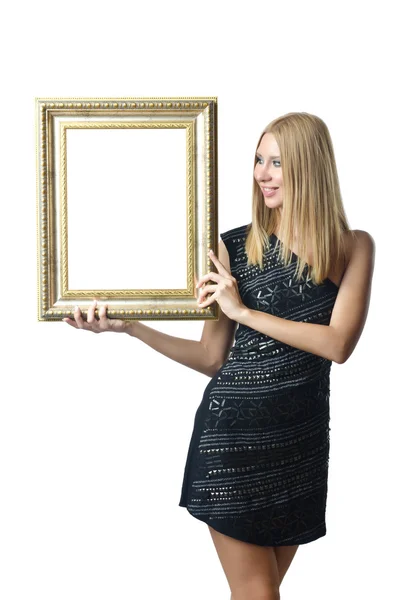 Mulher segurando quadro de imagem no branco — Fotografia de Stock